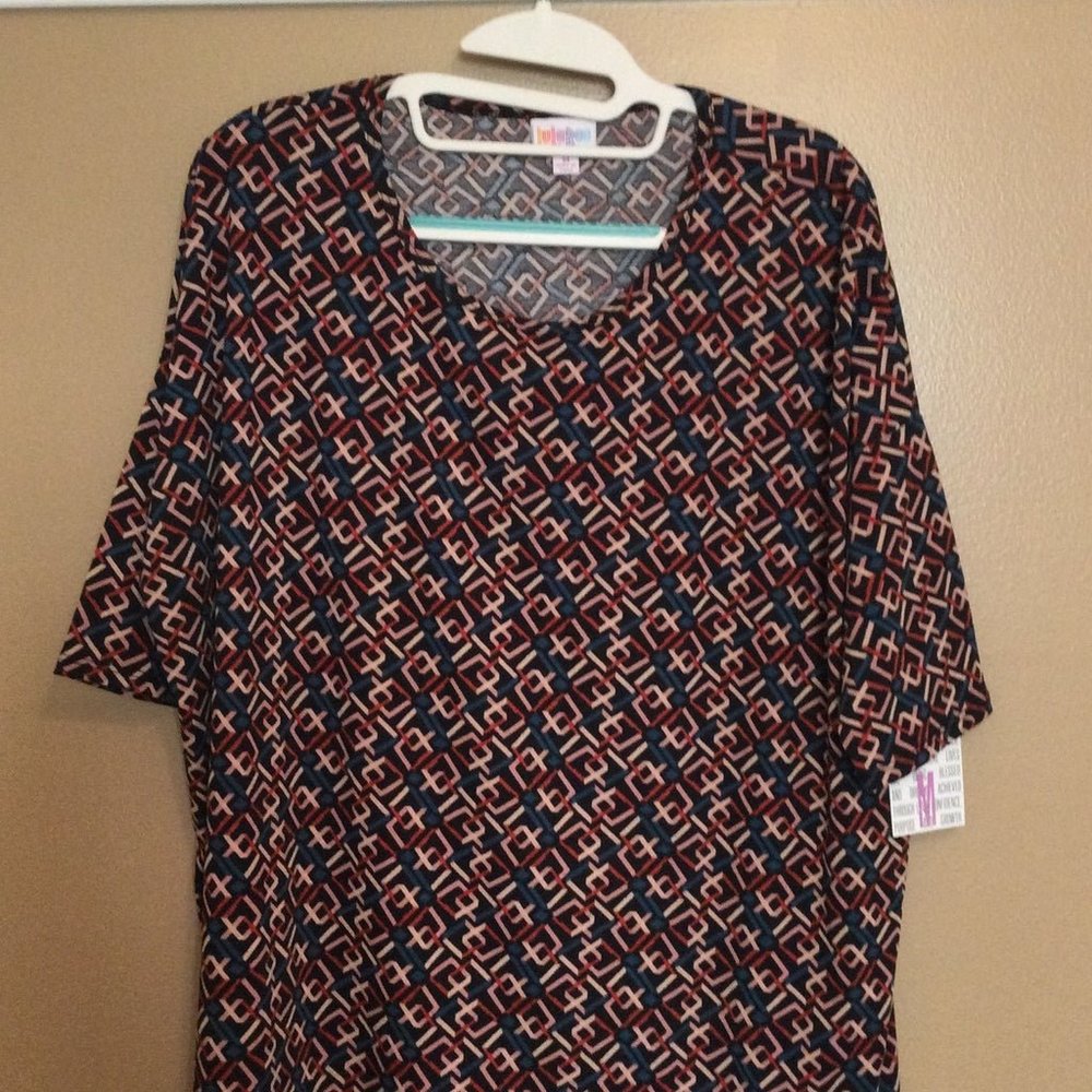 NWT Lularoe Irma shirt size Medium Black with a colorful geometric pattern